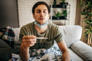 Man feeling sick and maybe showing early symptoms of infection