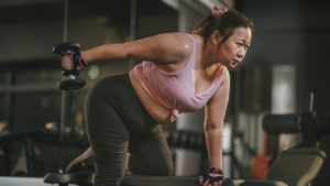 Woman completing split workout routine