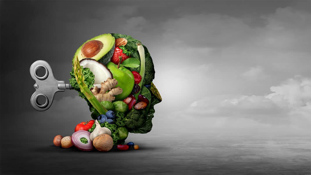 头由蔬菜和水果的图形显示营养不良和抑郁之间的联系
